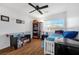 Bedroom with twin bed, air hockey table and bookcase at 8529 Copper Knoll Ave, Las Vegas, NV 89129