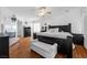 Main bedroom with king-size bed and ceiling fan at 8529 Copper Knoll Ave, Las Vegas, NV 89129