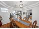 Bright dining room with hardwood floors and a view of the kitchen at 8529 Copper Knoll Ave, Las Vegas, NV 89129