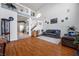 Bright living room featuring hardwood floors and a comfortable seating area at 8529 Copper Knoll Ave, Las Vegas, NV 89129