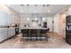 Spacious kitchen featuring an island, stainless steel appliances, and light gray cabinets at 8595 Old Daylily Ln, Las Vegas, NV 89113