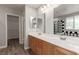 Double vanity bathroom with a checkered shower and floor at 8809 Early Horizon Dr, Las Vegas, NV 89178