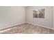 Bright bedroom with neutral walls and wood-look flooring at 8809 Early Horizon Dr, Las Vegas, NV 89178