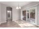 Dining area with sliding glass doors to backyard and hardwood floors at 8809 Early Horizon Dr, Las Vegas, NV 89178