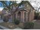 Two-story house with landscaping and walkway at 8809 Early Horizon Dr, Las Vegas, NV 89178