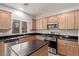 Modern kitchen with stainless steel appliances and an island at 8809 Early Horizon Dr, Las Vegas, NV 89178