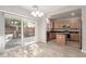 Modern kitchen with island, stainless steel appliances, and ample cabinet space at 8809 Early Horizon Dr, Las Vegas, NV 89178