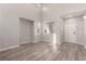 Bright living room with high ceilings and gray vinyl flooring at 8809 Early Horizon Dr, Las Vegas, NV 89178