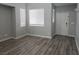 Bright living room featuring wood-look floors at 8809 Early Horizon Dr, Las Vegas, NV 89178