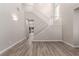 Living room with staircase, high ceilings, and gray flooring at 8809 Early Horizon Dr, Las Vegas, NV 89178