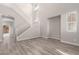 Living room with staircase, high ceilings, and gray flooring at 8809 Early Horizon Dr, Las Vegas, NV 89178