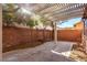 Spacious backyard patio with pergola and gravel landscaping at 8809 Early Horizon Dr, Las Vegas, NV 89178