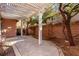 Covered patio with stamped concrete and pergola at 8809 Early Horizon Dr, Las Vegas, NV 89178