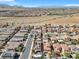 Aerial view of house and neighborhood, showcasing surrounding homes and landscape at 8862 Nannette Marie Ct, Las Vegas, NV 89148