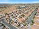 Aerial view showing home's location in a residential neighborhood with mountain views at 8862 Nannette Marie Ct, Las Vegas, NV 89148