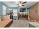 Cozy bedroom with a daybed, window seating and a TV at 8862 Nannette Marie Ct, Las Vegas, NV 89148