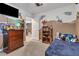 bedroom with built-in shelving and a twin bed at 8862 Nannette Marie Ct, Las Vegas, NV 89148