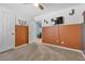 Bedroom with orange walls and a large TV at 8862 Nannette Marie Ct, Las Vegas, NV 89148