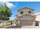 Two-story home exterior with attached garage and landscaping at 8862 Nannette Marie Ct, Las Vegas, NV 89148