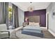 Bedroom with queen bed, purple wall and chandelier at 9000 Las Vegas Blvd # 2222, Las Vegas, NV 89123