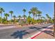 Gated community entrance with palm trees and landscaping at 9000 Las Vegas Blvd # 2222, Las Vegas, NV 89123