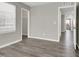 Bedroom with wood-look flooring, a closet, and a window for natural lighting at 9202 Valley Betica Ave, Las Vegas, NV 89148