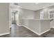 Upper hallway with gray walls and wood-look flooring at 9202 Valley Betica Ave, Las Vegas, NV 89148