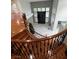 Two-story living room with fireplace and marble floors at 9703 Newport Coast Cir, Las Vegas, NV 89147