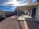 Covered patio and gravel backyard with desert landscaping at , Henderson, NV 89014