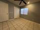 Bedroom with ceiling fan and sliding door to closet at , Henderson, NV 89014