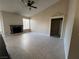 Bright living room with tile floors, fireplace, and ceiling fan at , Henderson, NV 89014