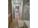 Bright bathroom with a glass-enclosed shower and tile flooring at 10046 Dancing Lasso Ct, Las Vegas, NV 89178