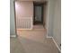 Upstairs hallway with carpeted floors and neutral walls at 10046 Dancing Lasso Ct, Las Vegas, NV 89178