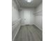 Well-organized walk-in closet featuring wire shelving, white trim, and a full door at 10046 Dancing Lasso Ct, Las Vegas, NV 89178