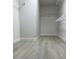 A walk-in closet with vinyl flooring and wire rack shelving at 10046 Dancing Lasso Ct, Las Vegas, NV 89178
