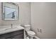 Modern powder room with updated vanity and textured wall tiles at 10226 Jade Gardens Dr, Las Vegas, NV 89135