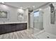 Modern bathroom with double vanity and glass shower at 10226 Jade Gardens Dr, Las Vegas, NV 89135