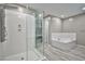 Spa-like bathroom with soaking tub and shower at 10226 Jade Gardens Dr, Las Vegas, NV 89135