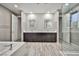 Modern bathroom with double vanity and shower at 10226 Jade Gardens Dr, Las Vegas, NV 89135