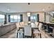 Elegant dining room features a large concrete table and seating for ten at 10226 Jade Gardens Dr, Las Vegas, NV 89135