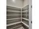 Large walk-in pantry with ample shelving for extra storage at 10226 Jade Gardens Dr, Las Vegas, NV 89135