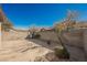 Private backyard patio with block wall and gravel landscaping at 10229 Birch Bluff Ln, Las Vegas, NV 89145