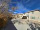 Spacious backyard with covered patio and basketball goal at 1113 Dawn Valley Dr, North Las Vegas, NV 89031