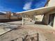 Covered patio and spacious backyard with room for entertaining at 1113 Dawn Valley Dr, North Las Vegas, NV 89031