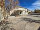 Large backyard with covered patio and basketball court at 1113 Dawn Valley Dr, North Las Vegas, NV 89031