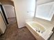 Bathroom with garden tub and separate shower at 1113 Dawn Valley Dr, North Las Vegas, NV 89031