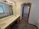 Bathroom features double vanity and access to bedroom at 1113 Dawn Valley Dr, North Las Vegas, NV 89031