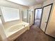 Relaxing bathroom with soaking tub and separate shower at 1113 Dawn Valley Dr, North Las Vegas, NV 89031