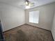 Bright bedroom with ceiling fan and carpet at 1113 Dawn Valley Dr, North Las Vegas, NV 89031