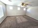 Well-lit bedroom with multiple windows and ceiling fan at 1113 Dawn Valley Dr, North Las Vegas, NV 89031